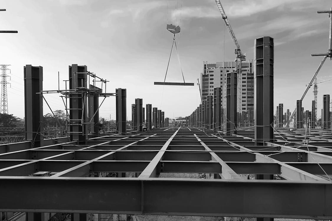 Modern urban construction site with steel beams